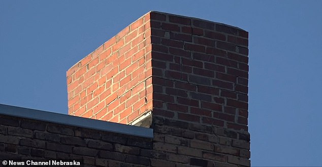 It is unclear how he ended up in the chimney (photo) and how long he was there.  His body was found after a handyman investigated a suspicious odor coming from the building's chimney and said he saw what appeared to be a human shoe dangling from it.