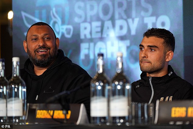 Family: Aadam (R) made his professional boxing debut on August 26 (photo with his father Prince Naseem Hamed, left)