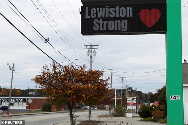 A sign of support can be seen above a deserted street in Lewiston