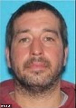 A multi-agency manhunt is underway for suspected gunman Robert Card, 40