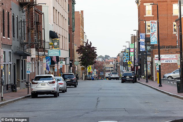 The streets are nearly empty as people take shelter after a mass shooting and subsequent manhunt