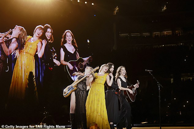 Epic: Alana and Danielle are two-thirds of the indie rock band Haim, which opened for Swift during her six sold-out Eras Tour shows in Los Angeles in August;  (L-R) Este, Taylor, Danielle and Alana seen performing on August 3