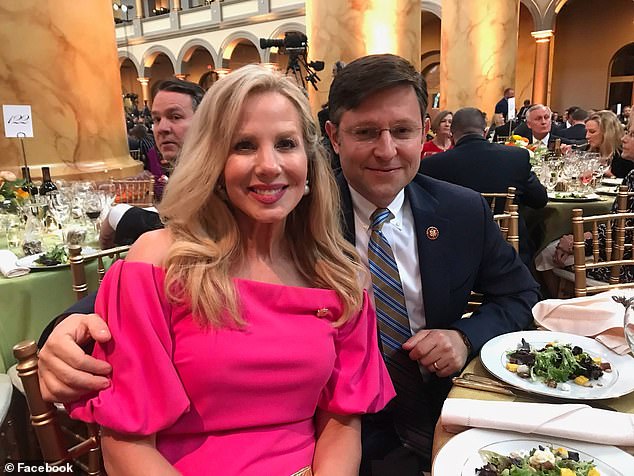 Johnson, pictured here with his wife Kelly (left), entered Congress in 2017 and is serving his fourth term