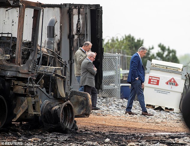 Atlanta officials inspect damage from anti-police activists who vandalized a site in Atlanta, Georgia