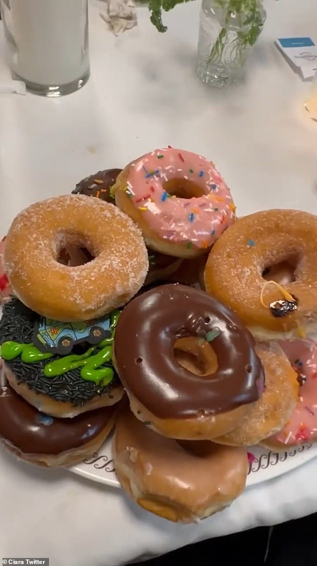 Looks good: The artist also showed off a huge plate of donuts as part of the menu