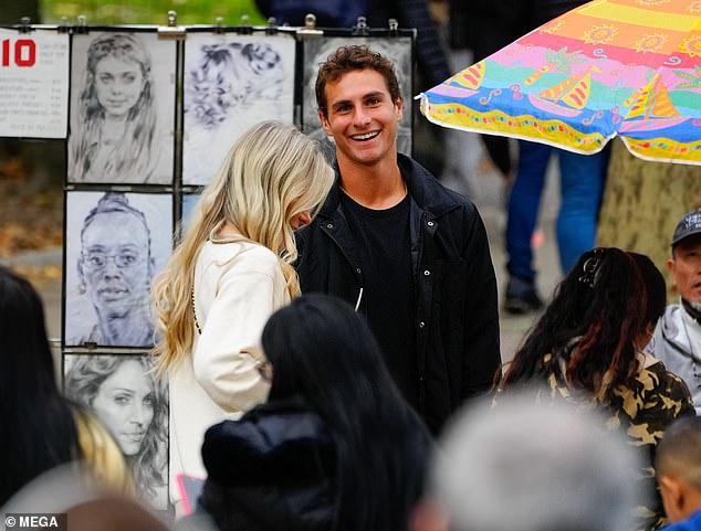 Alex and Crystal were aware that they were being photographed during their walk, but they didn't seem to care