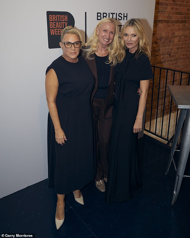 Celebrations: Kate said at the event: 'Beauty goes beyond the skin, it is the heartbeat of the creative industry that has helped build my career... (pictured with council members)