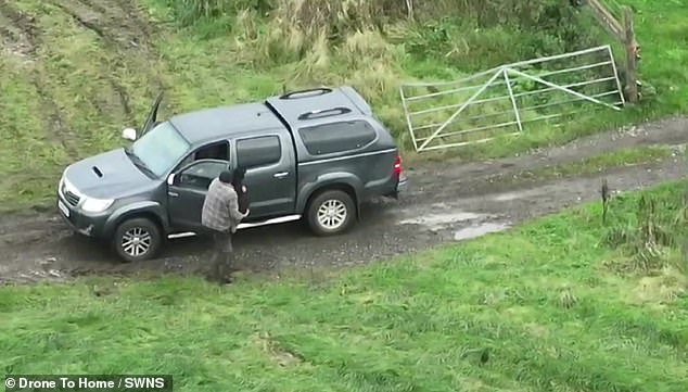 The man then leads Molly to the safety of the car and places her in the front passenger seat