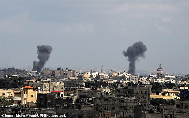 Smoke rises after an Israeli attack on Gaza City.  Economists are watching the conflict closely to see how it affects global trade and commodities