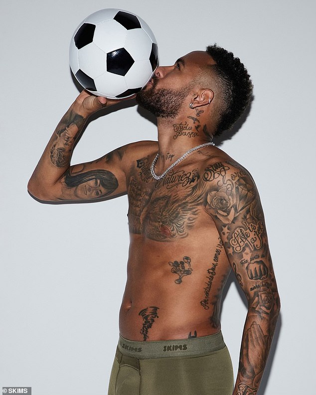 Tatt is nice: Footballer Neymar Jr showed off his body art as he posed up a storm for Kim's new SKIMS range