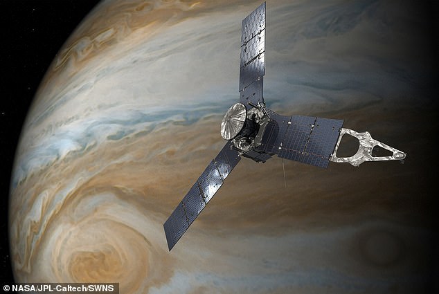 Orbiter: It's not the first time NASA's Juno spacecraft (shown in an artist's impression) has produced such an image.  The images it gets of Jupiter's clouds as they orbit high above the largest planet in our solar system often lead to the so-called phenomenon of pareidolia