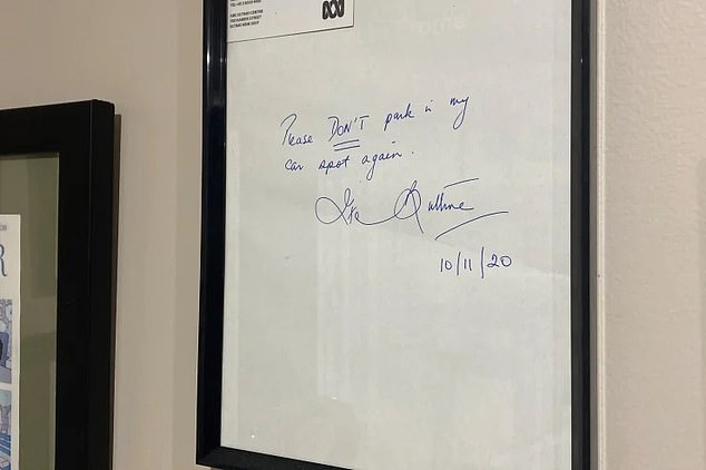 The note Mrs. Buttrose left in Sales' car now hangs on the wall behind her desk