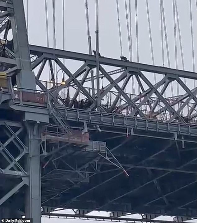 Two people were seen crawling past the massive structure as police responded to the call