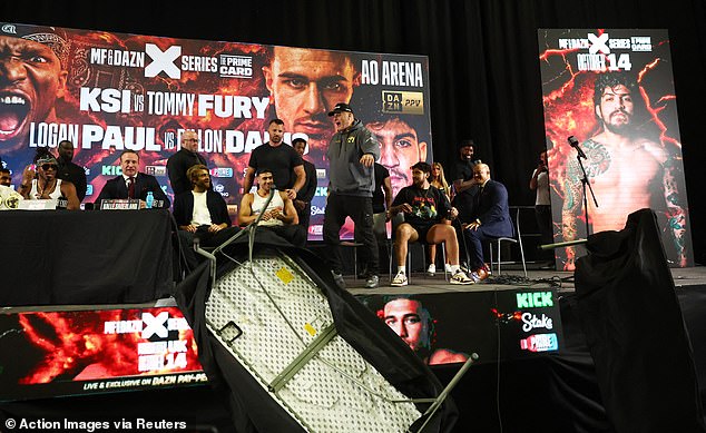 Unlike his father, Tommy Fury remained relatively calm as chaos erupted around him