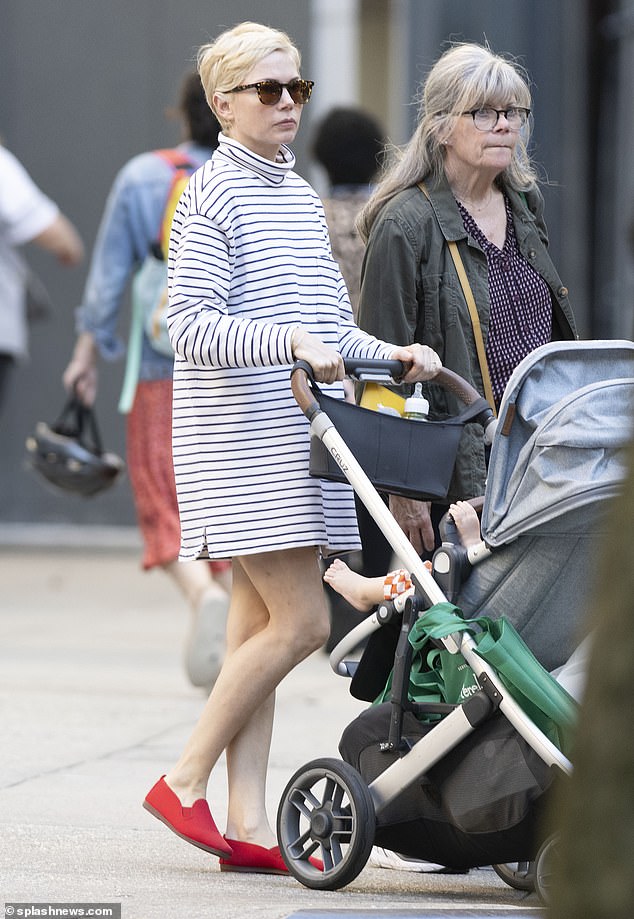 Family affair: The Oscar-nominated actress, 43, was spotted pushing the baby in a stroller next to her mother Carla