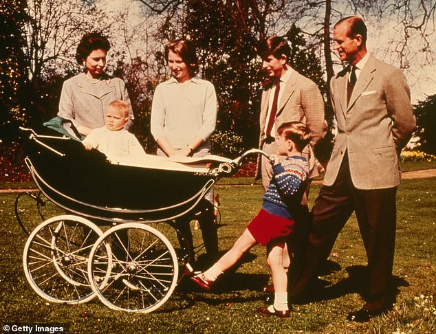 A photo from 1965 shows Queen Elizabeth II and Prince Philip with their children, Prince Charles, Princess Anne, Prince Andrew and Prince Edward in his Silver Cross