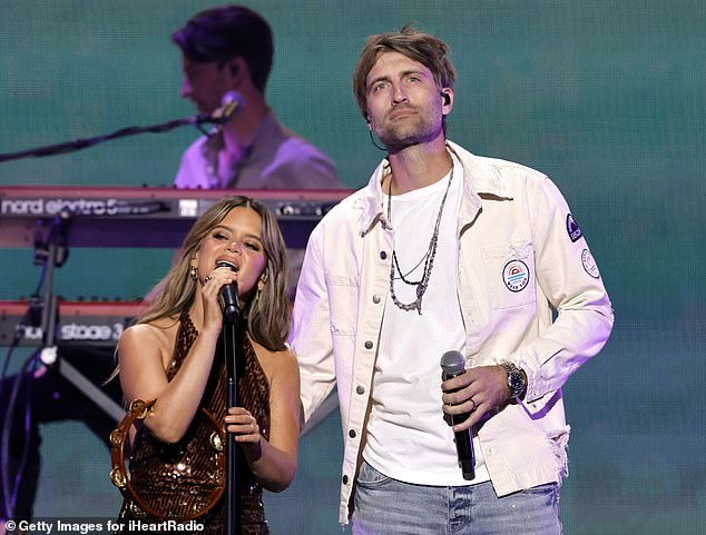 Ryan is said to be 'heartbroken' by the filing, according to insiders.  The couple pictured at the 2022 iHeartRadio Music Festival