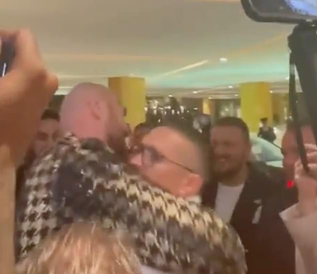 During the embrace, Usyk then lifted Fury – who recently called the Ukrainian a 'sausage'