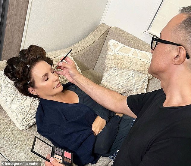 Getting glam: Matin Maulawizada, pictured doing Kristen Davis' makeup, has lost a lot of work due to the strikes