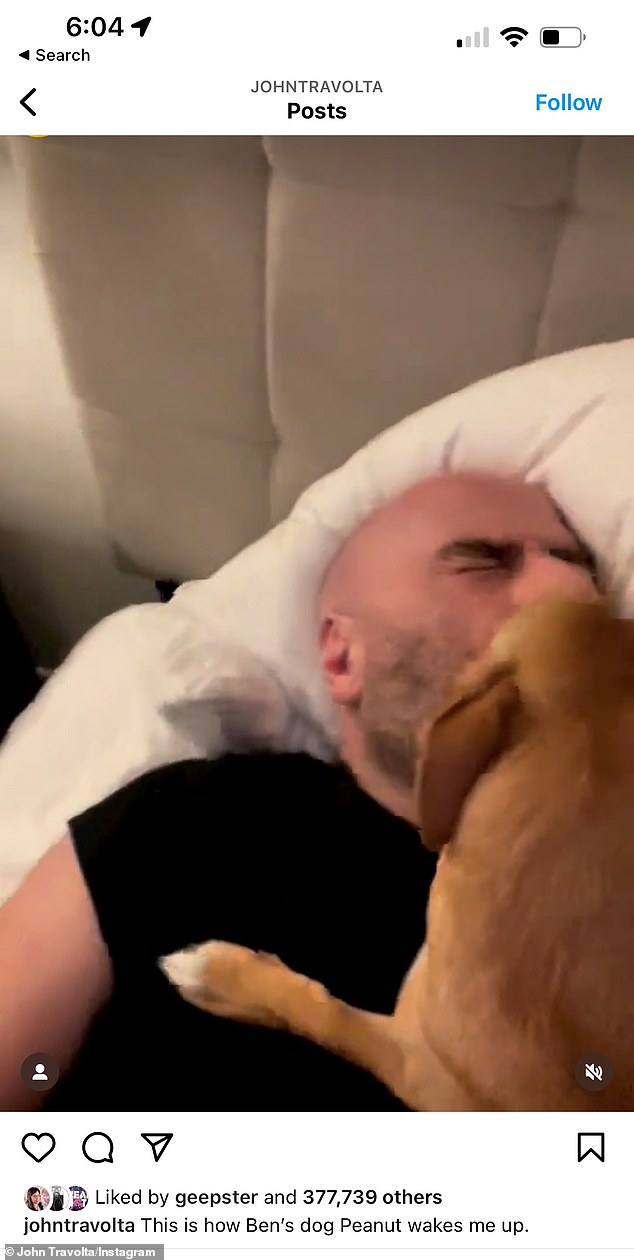 Alarm clock: Just six months after he was adopted, the lively pooch could be seen licking Travolta's face as a way to wake him from his sleep