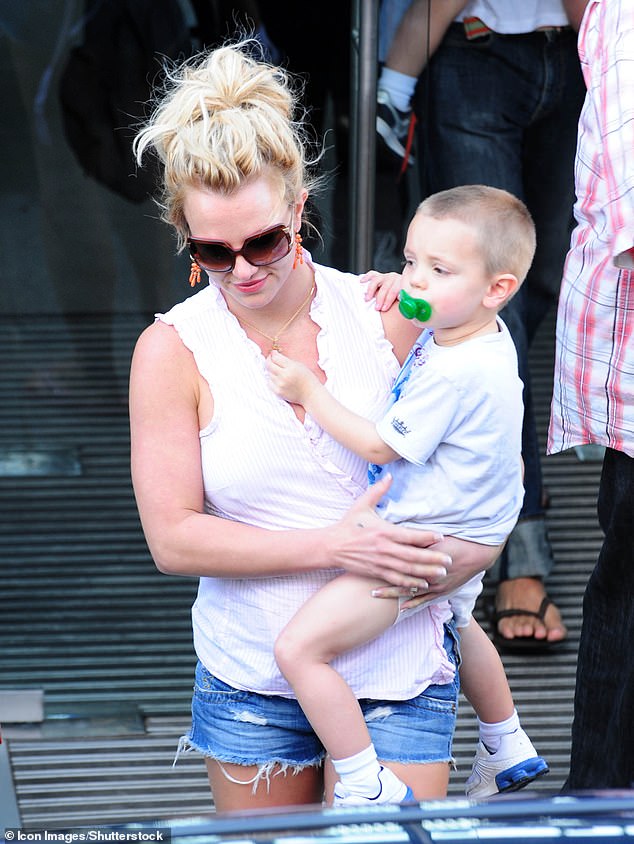 Britney looked tense as she carried her son in Sydney, Australia, during a break from the tour