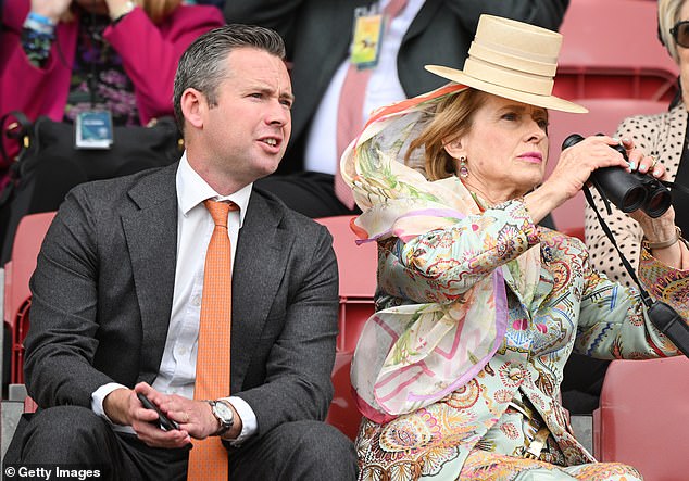 Trainers Gai Waterhouse and Adrian Bott watch intently during race three in Mooney Valley