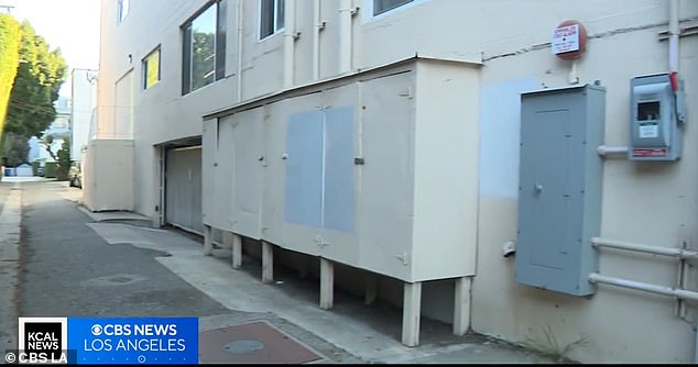 Workers painted over the anti-Semitic message on the Holocaust survivor's building starting Thursday