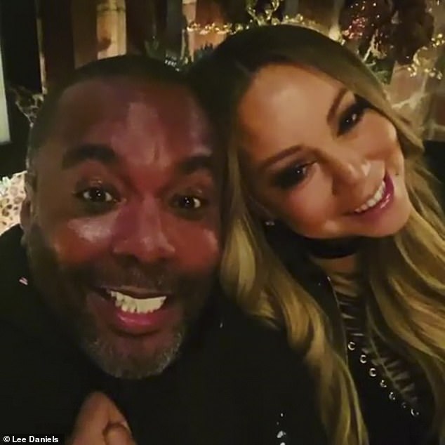 Lol: Carey later posted an Instagram video with Precious director Lee Daniels, in which she pretended to kick Daniels as he said, 