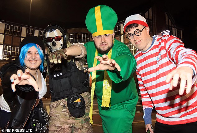 People dressed up as Wally, the Pope, a dead soldier and a gothic character