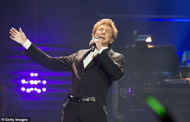 A Time and a Place: Phone questions are answered with Barry Manilow releasing Can't Smile Without You