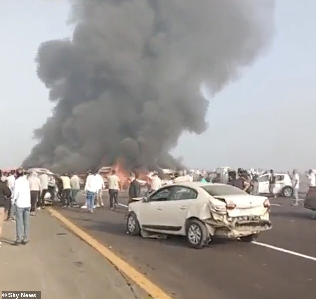 An oil leak is believed to have caused a fire that spread to other cars nearby.  Clouds of black smoke billowed into the sky as the burnt orange glow could be seen for miles