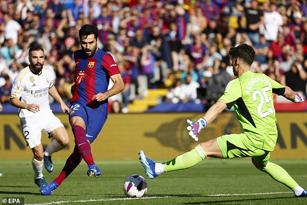 Ilkay Gundogan (left) put the hosts 1-0 in the sixth minute of the match and scored his first goal for the club