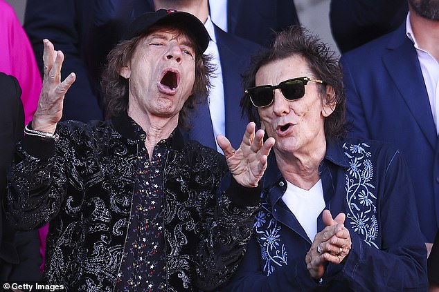 animated: Frontman Mick, 80, appeared in good spirits as he gasped, pointed and cheered energetically throughout the 90-minute match, while Ronnie, 76, clapped along