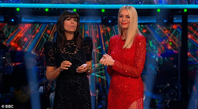 Beautiful: Claudia wore a black lace dress with large puff sleeves, while Tess opted for a red mini dress with sequins and fringes