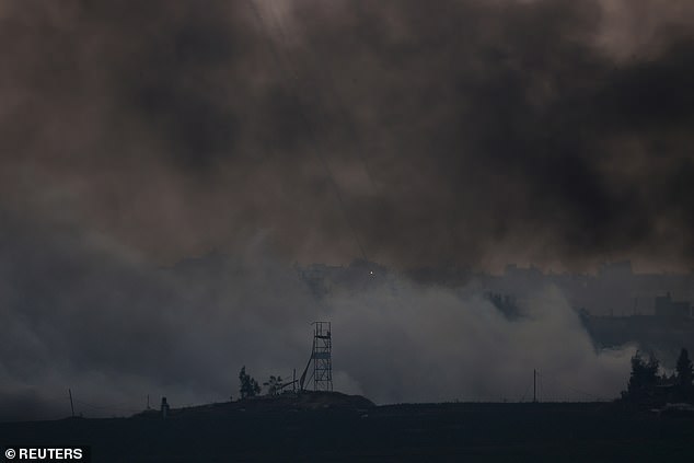 Smoke rises over Gaza, seen from the Israeli border with Gaza on Saturday