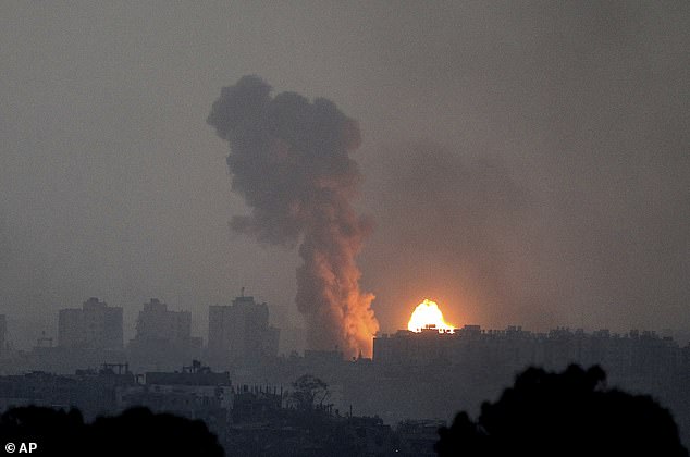 Fire and smoke rise after an Israeli airstrike in the Gaza Strip, seen from southern Israel