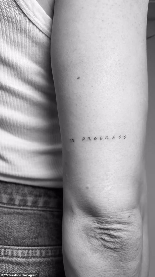 Arm art: The other new tattoo features the words 