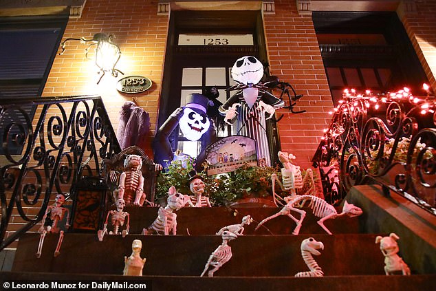 Miniature skeletal animals, including snakes, dinosaurs, dogs and more, took over the steps of a home in Hoboken, New Jersey