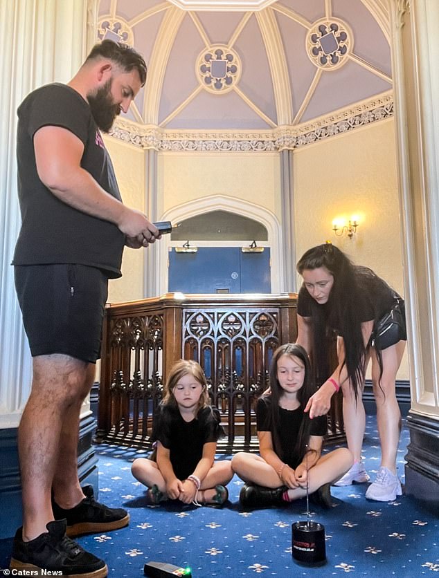 Mr. Kenny and Mrs. Jeffrey are seen with their daughters on a ghost hunt