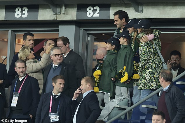 His mother Lynette Federer (left taking a photo) – originally from South Africa – was also present at the match