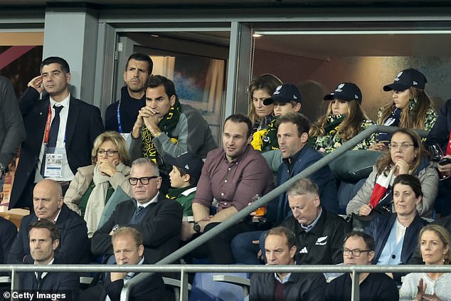 Roger seemed engrossed in the action, along with his wife Mirka, their four children and his mother