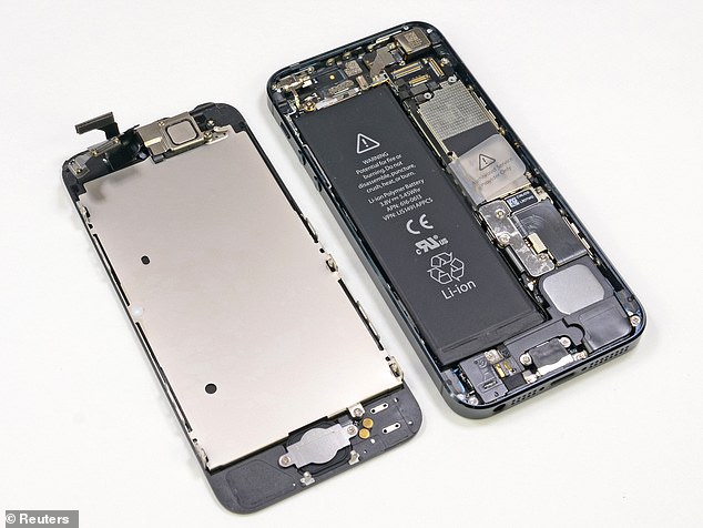 The teardown found that the iPhone 15 Pro Max costs Apple $558 (£460) in total, a 12 per cent increase over the production cost of the 14 Pro Max.  Pictured: iPhone 5 disassembled
