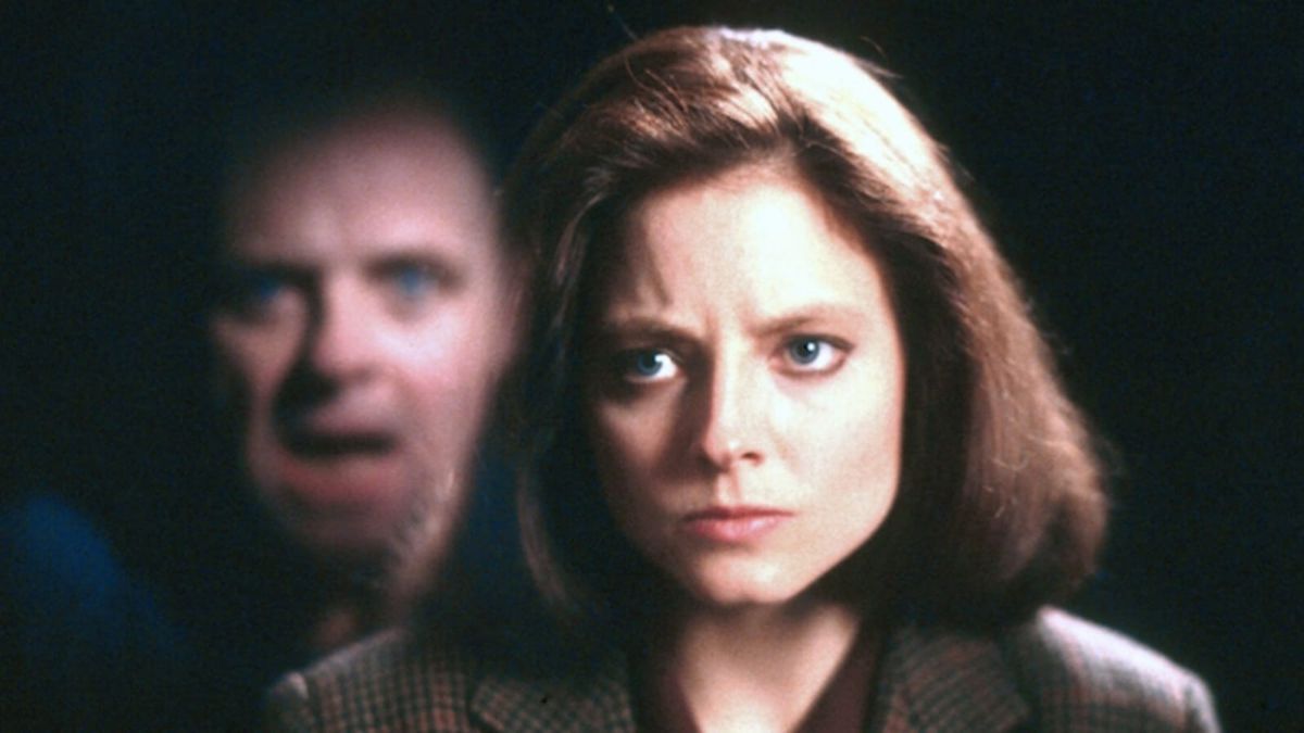 Clarice Starling (Jodie Foster) seeing Hannibal Lector (Antony Hopkins), his visible reflection in the mirror of his prison cell in The Silence of the Lambs.