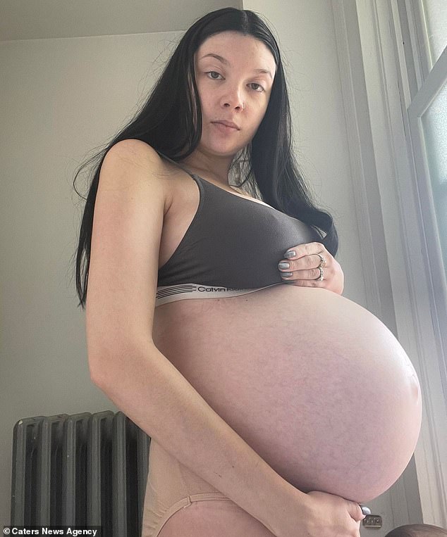 The 27-year-old (shown during her first surrogacy) noted that after she had her baby, it dawned on her that she could help those struggling to conceive