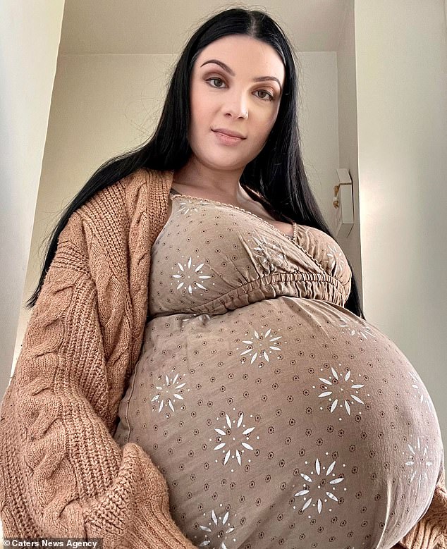 And the 27-year-old (pictured during her first surrogacy) revealed that the families she has helped along her journey have welcomed her with open arms