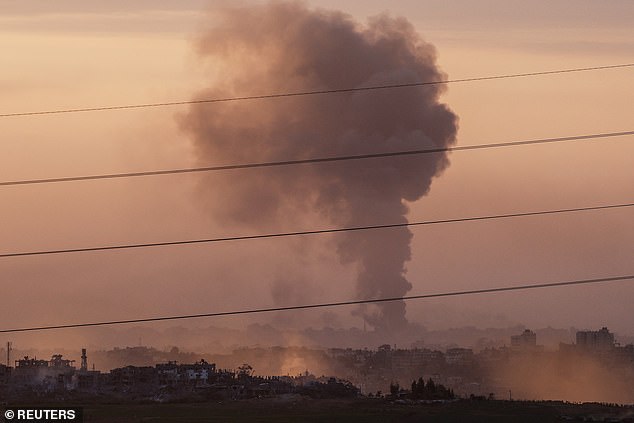 The evening sky over Gaza is filled with smoke from continued Israeli bombardments