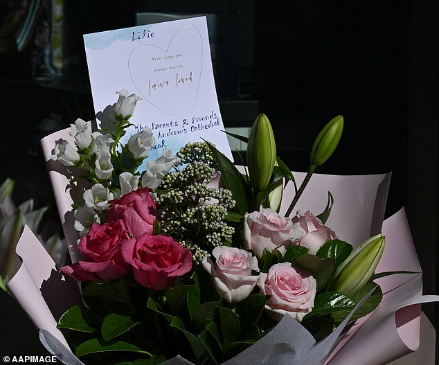 Lovers have left touching flower arrangements at the entrance to the school where Lilie James' body was found on Wednesday evening.