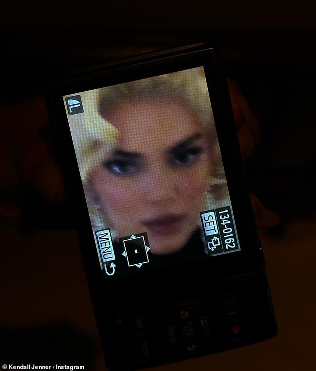 Artistic: The photo carousel included a close-up of Kendall's face on a camera screen