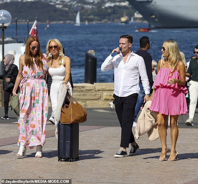 Joined by a group of friends, the lookalike duo spent the day drinking champagne on a private yacht as they cruised Sydney Harbour, a day after Jackie's interview with Gwyneth Paltrow at the Besties event at Aware Super Theatre.