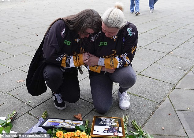 Fans laid flowers outside the Motorpoint Arena in Nottingham yesterday following Johnson's death